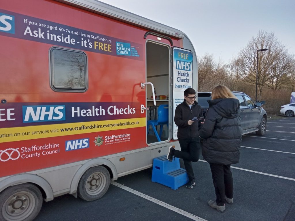 NHS Health Check trailer with user